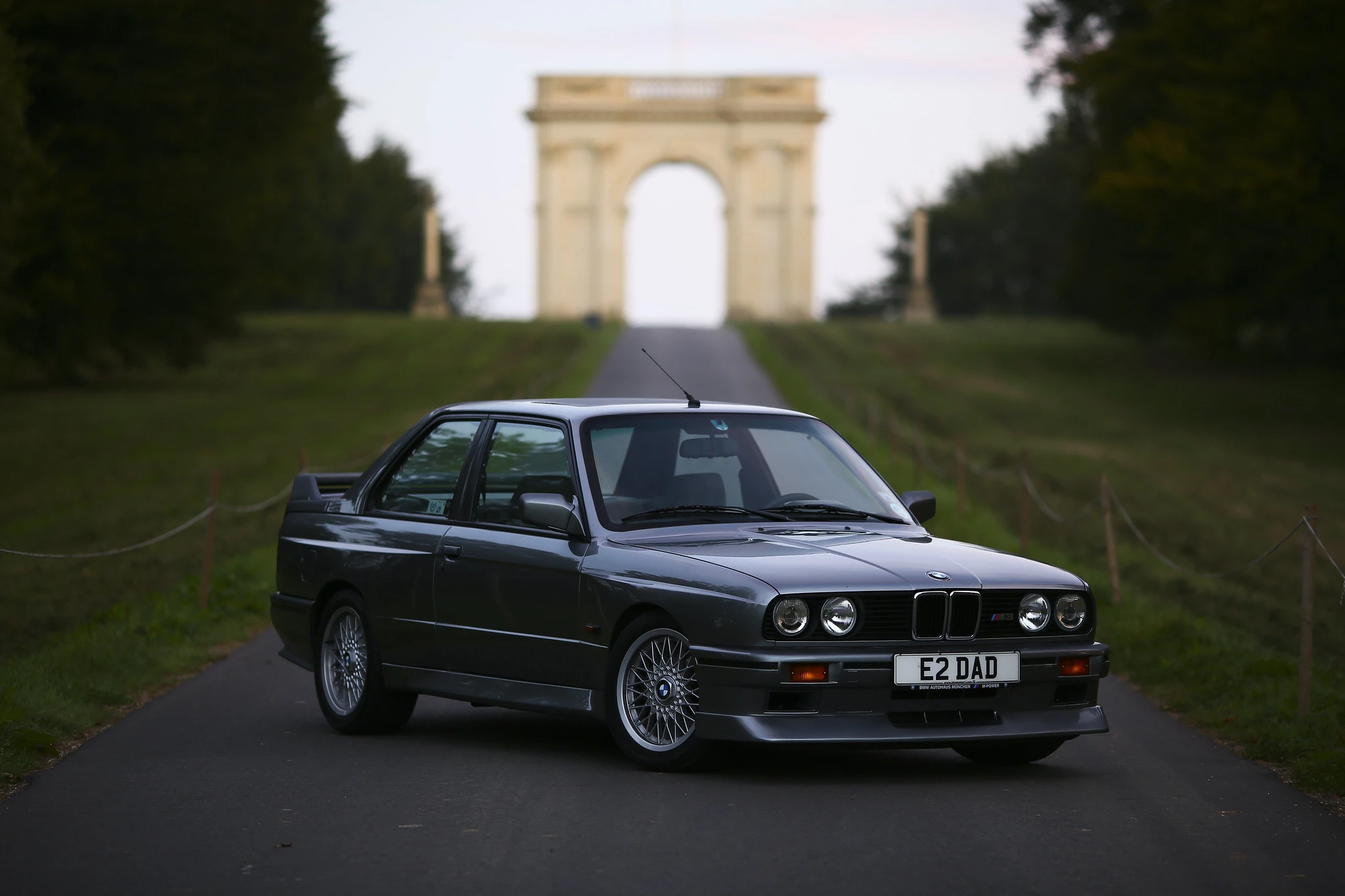 Gray E30 M3 on a country road